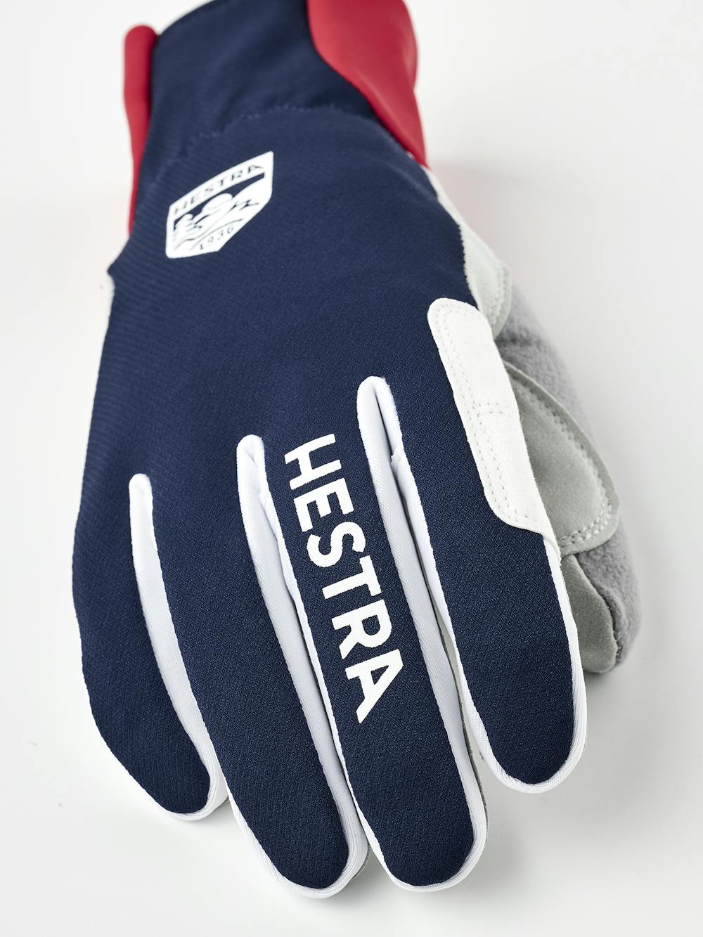 Dark blue and red fabric cross-country ski glove with gray synthetic suede palm (3 of 5)