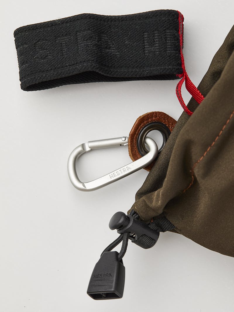 Dark green glove with brown cow hide in the inner hand
 (5 of 5)
