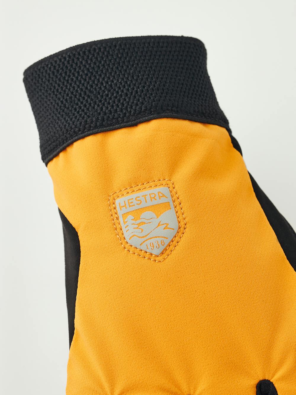 Oranger Fahrradhandschuh aus Stoff mit schwarzer Innenhand aus synthetischem Wildleder (5 oder 5)