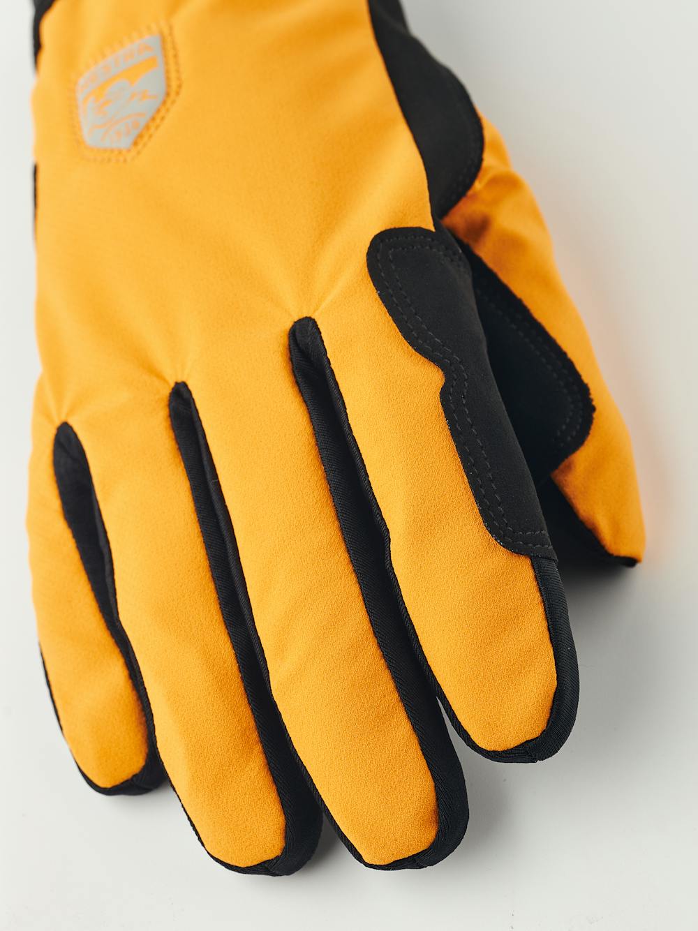 Oranger Fahrradhandschuh aus Stoff mit schwarzer Innenhand aus synthetischem Wildleder (3 oder 5)