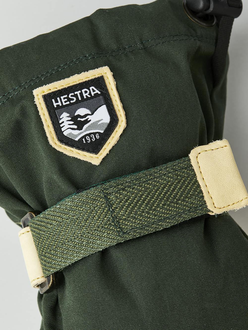 Dunkelgrüner Fausthandschuh aus Stoff mit hellgelbem Rindsleder  (4 oder 9)