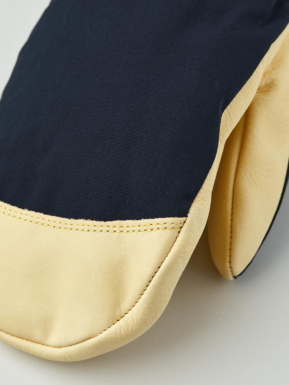 Dark blue fabric mitten with light yellow cow hide palm (7 of 8)
