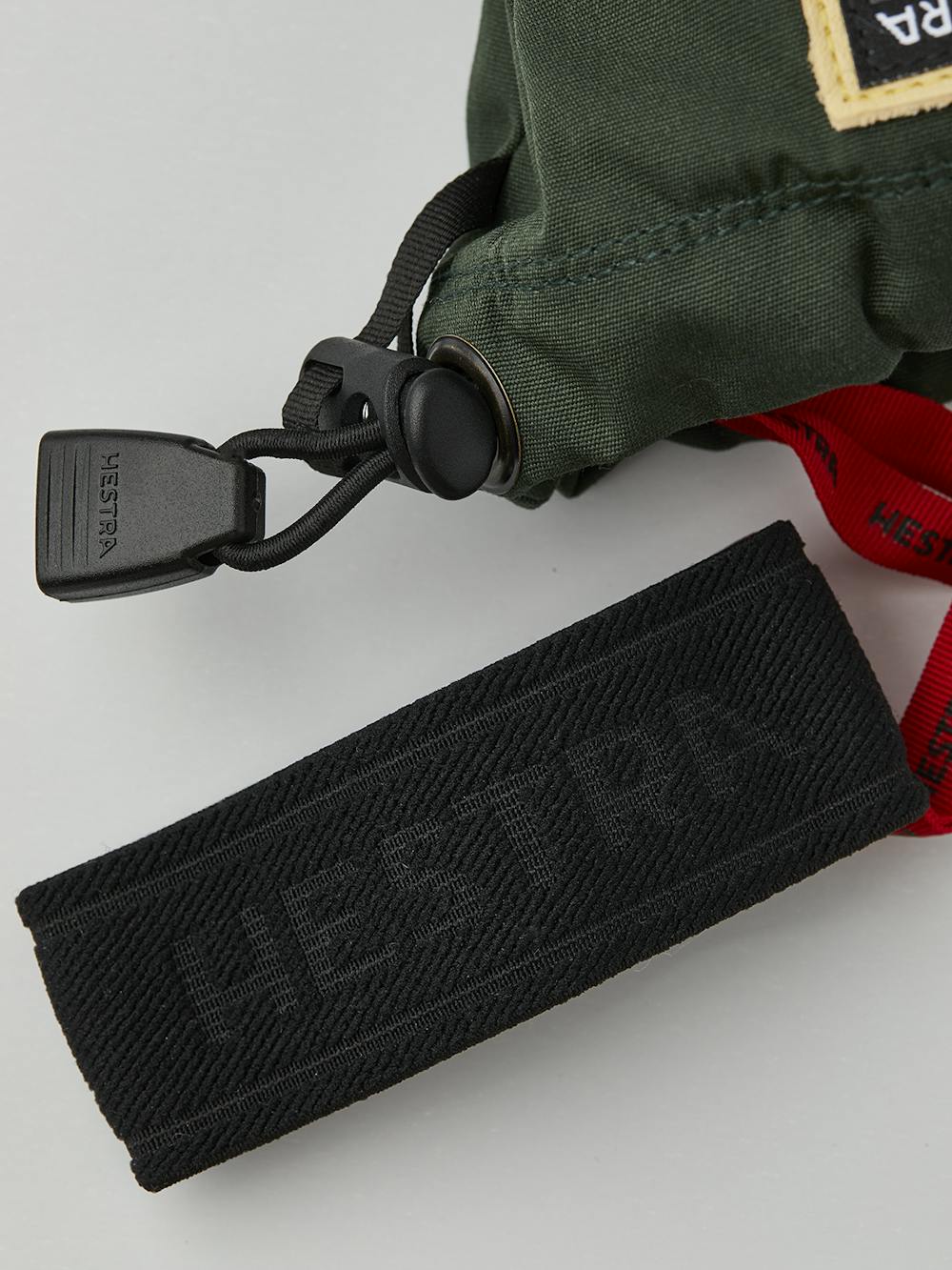 Dunkelgrüner Fausthandschuh aus Stoff mit hellgelbem Rindsleder  (3 oder 9)