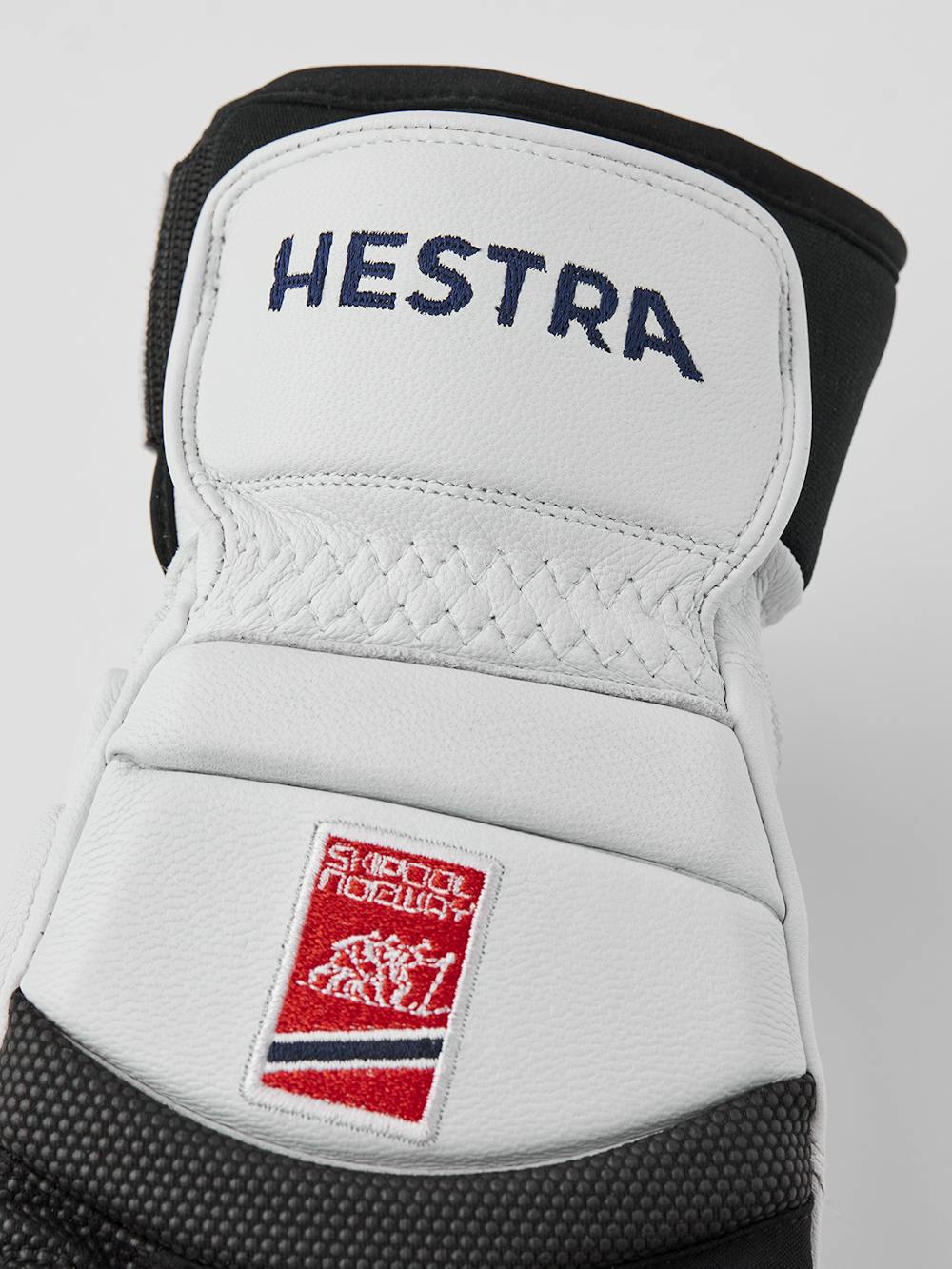 Weißer Skihandschuh aus Ziegenleder mit grauen Protektoren auf der Oberseite 
 (3 oder 5)