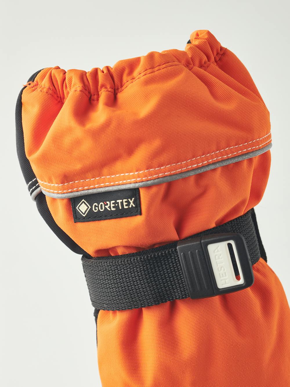 Orange fabric mitten with black synthetic palm and wrist adjustment (4 of 4)