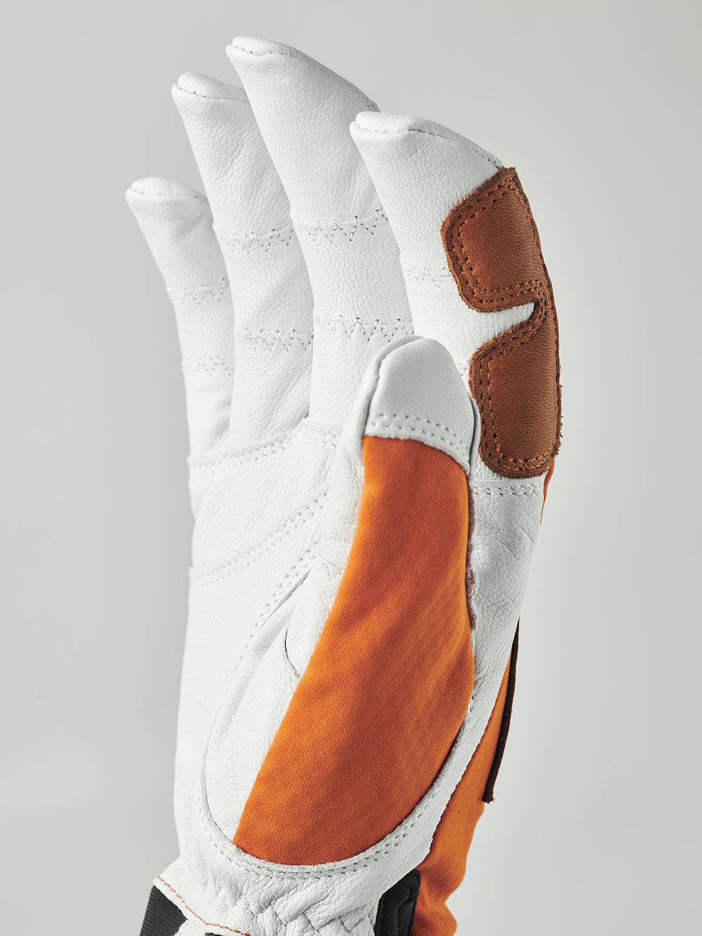 Orange glove with white goat leather palm
 (7 of 9)