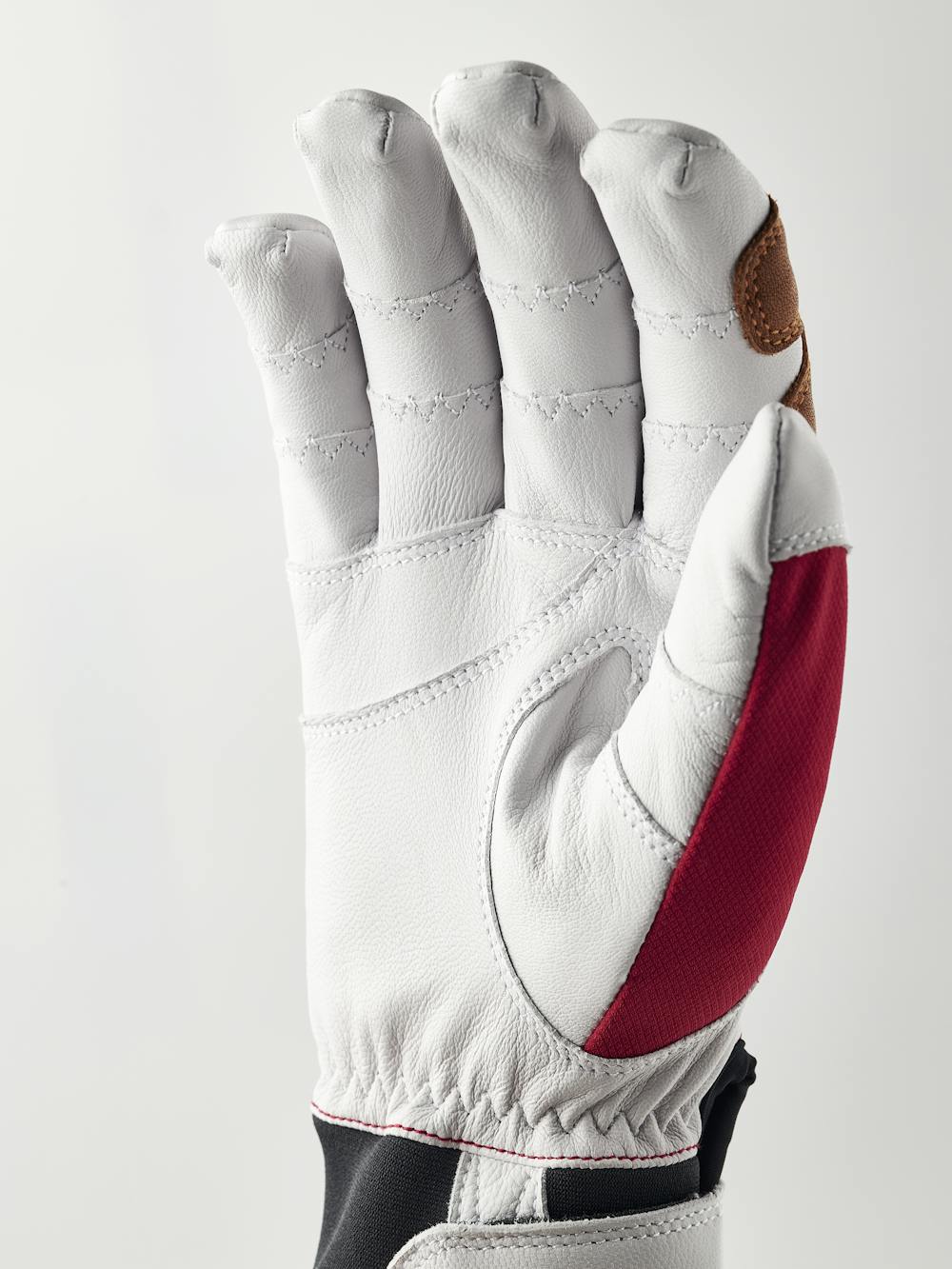 Red glove with white goat leather palm
(2 of 9)