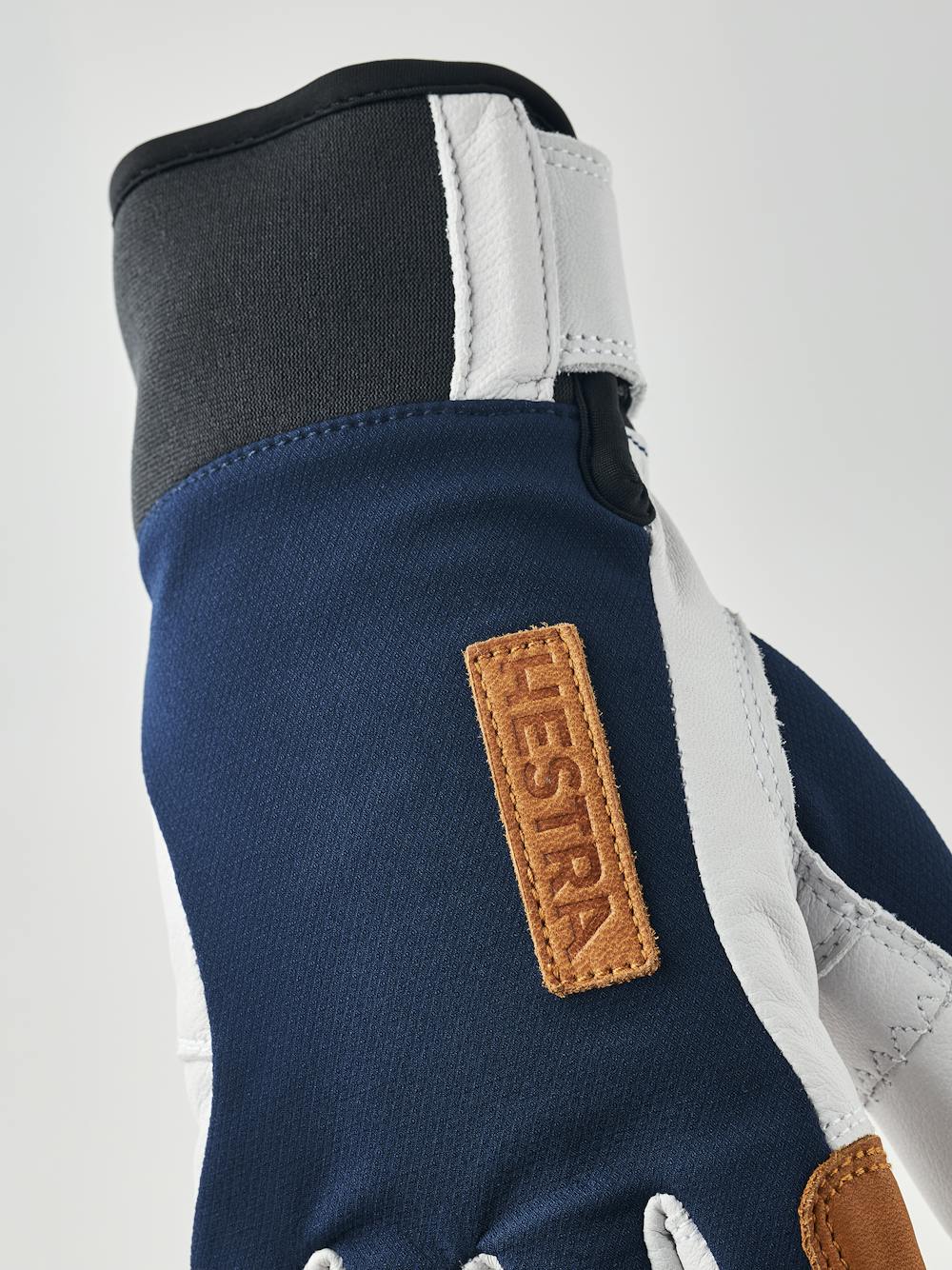 Dark blue glove with white goat leather palm
(6 of 8)