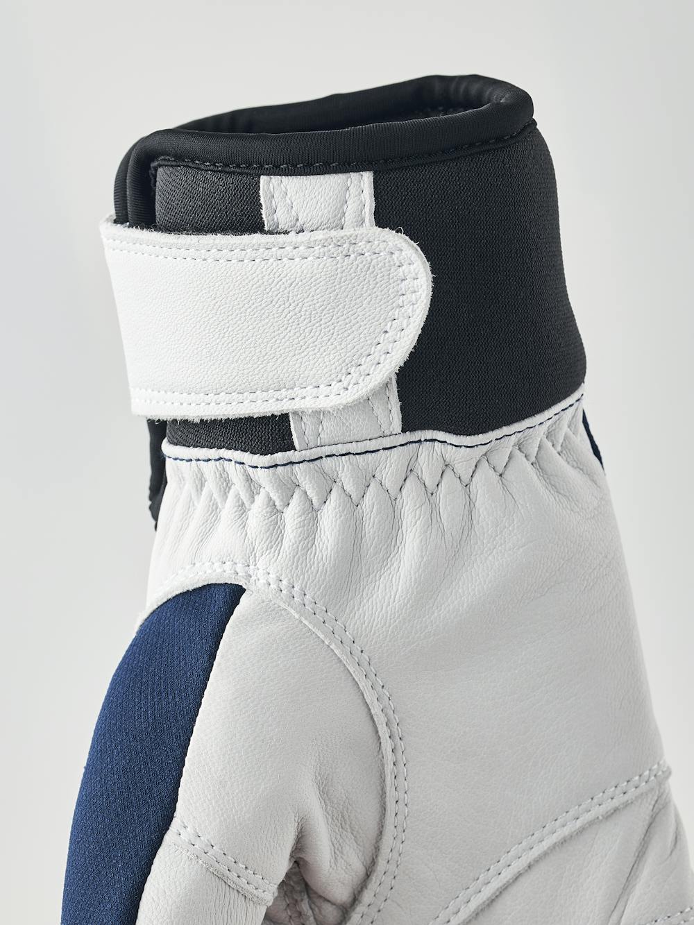 Dark blue glove with white goat leather palm
(3 of 8)