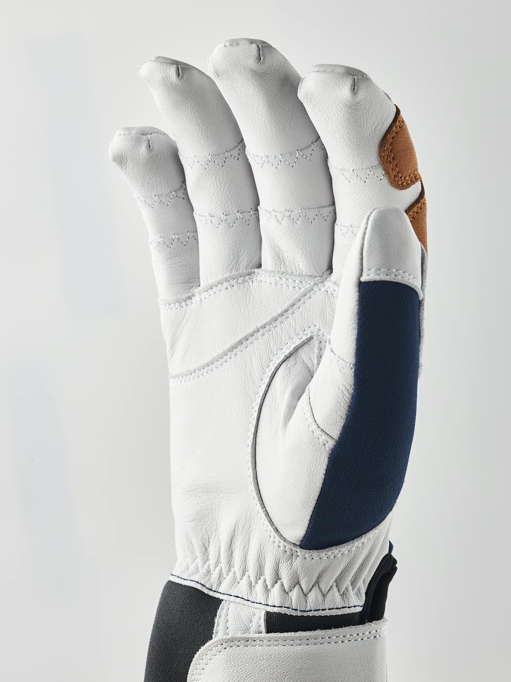Dark blue glove with white goat leather palm
(2 of 8)