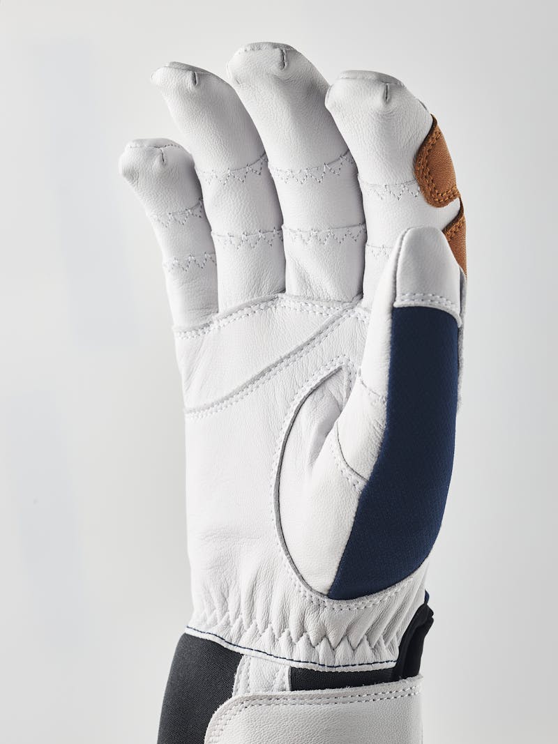 Dark blue glove with white goat leather palm
 (2 of 10)