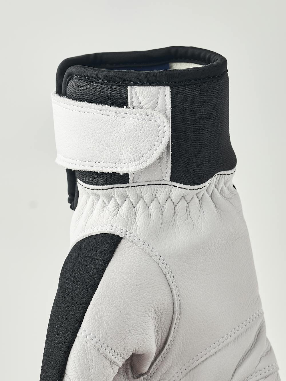 Black glove with white goat leather palm
(3 of 5)