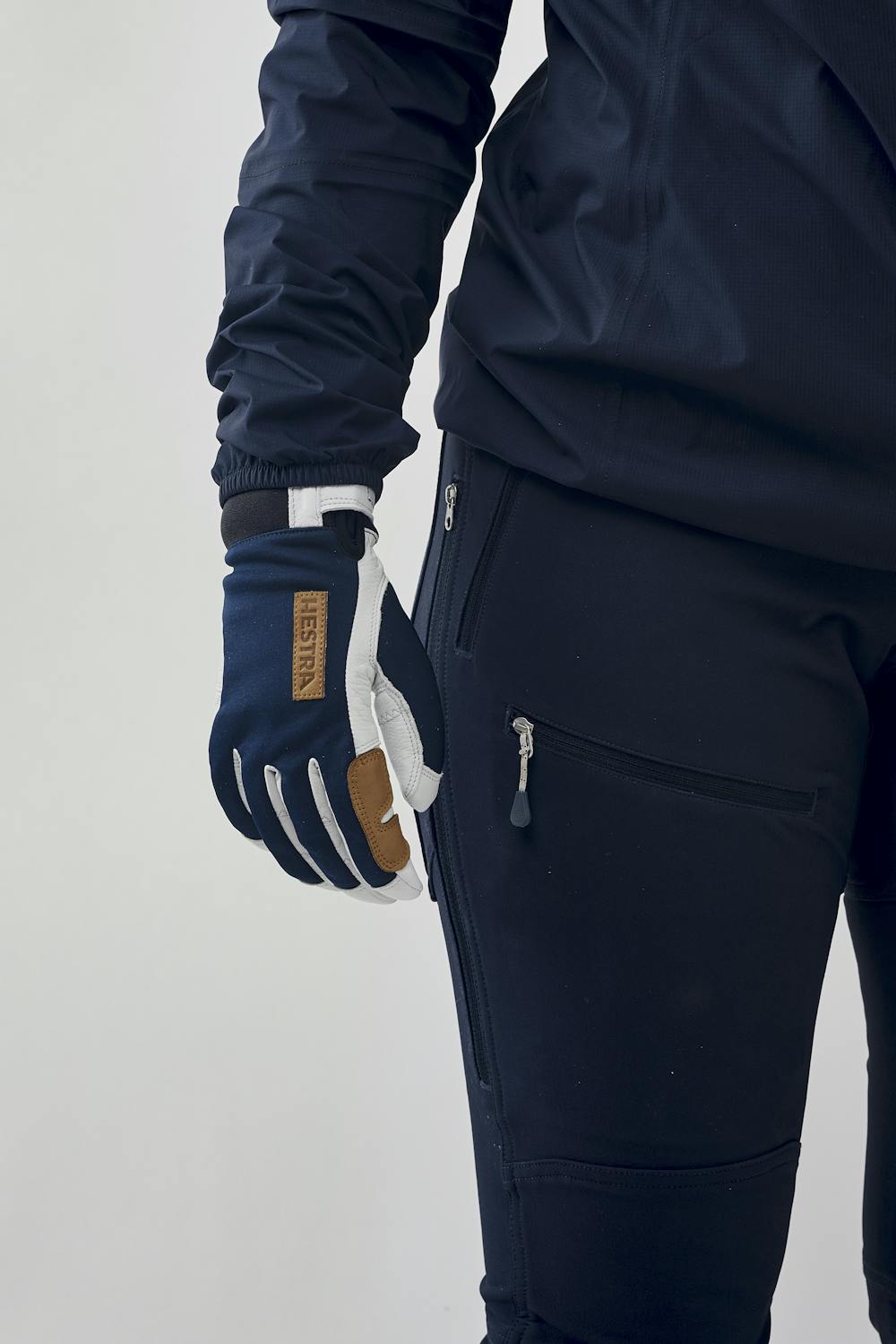 Dark blue glove with white goat leather palm
(7 of 8)