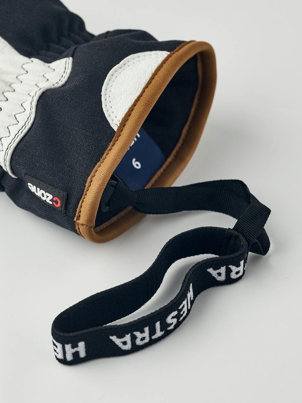 Black mitten with white goat leather palm and wrist strap (8 of 9)