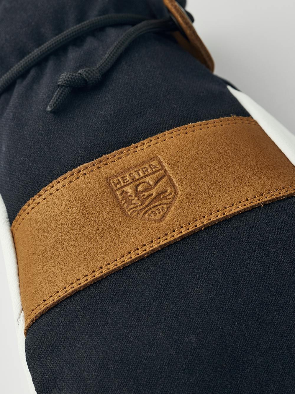 Black mitten with white goat leather palm and wrist strap (5 of 9)