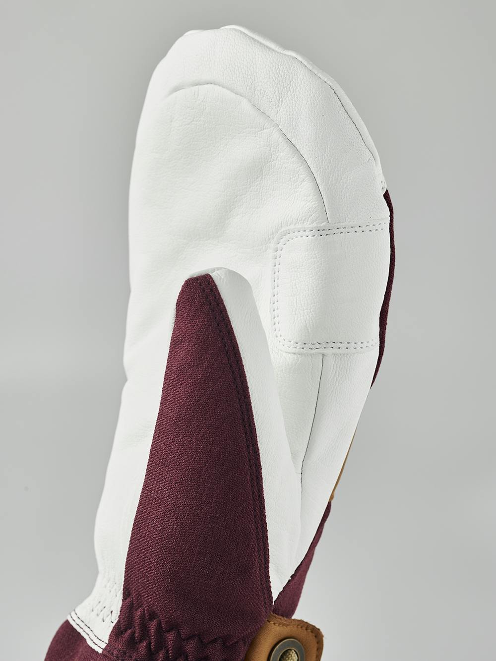 Bordeauxroter Fausthandschuh mit weißem Ziegenleder an der Innenhand und Handgelenkschlaufe (3 oder 10)