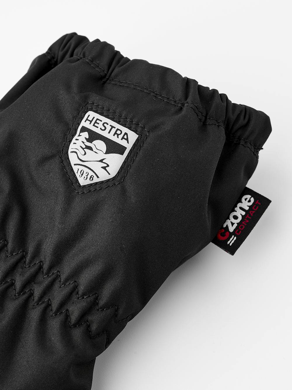 Svart skaltumhandske i tyg
 (3 av 4)