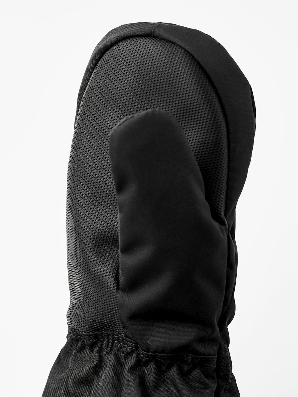 Svart skaltumhandske i tyg
 (2 av 4)