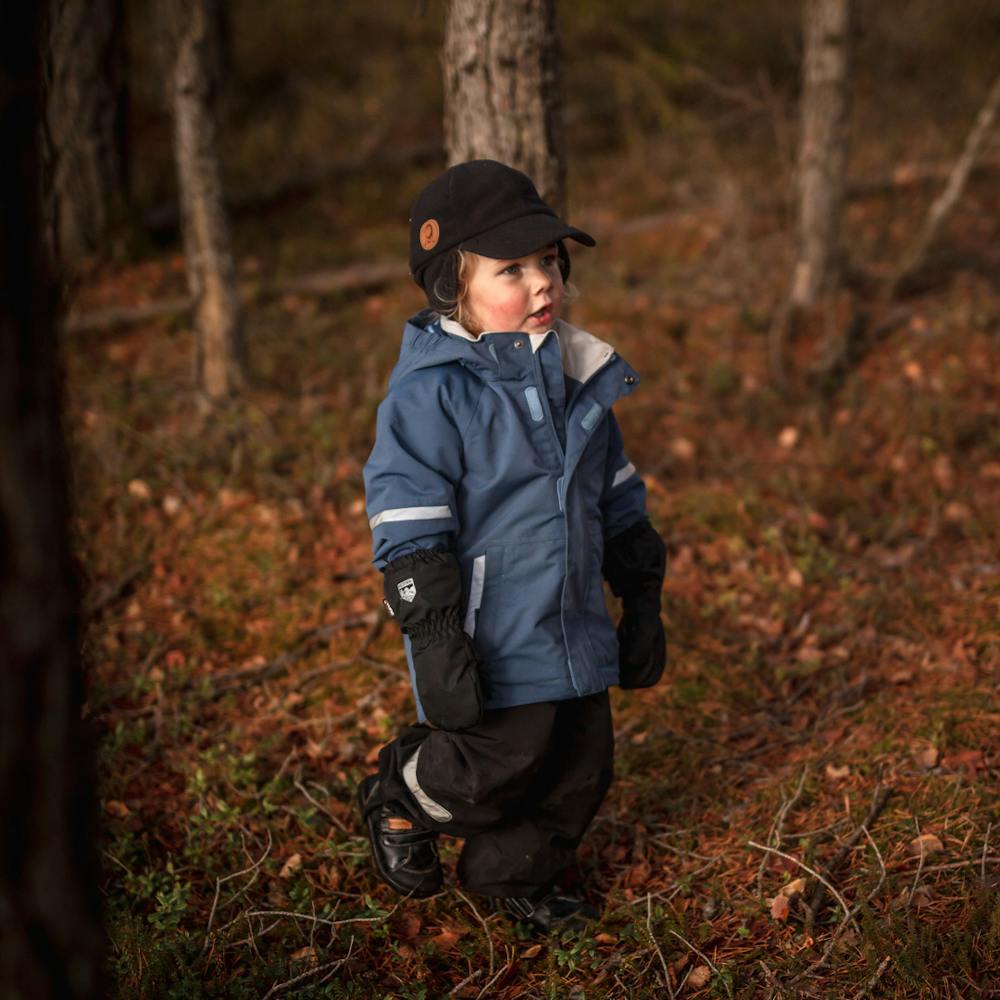 Svart skaltumhandske i tyg
 (4 av 4)