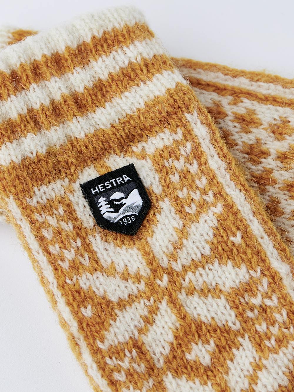 Dark yellow and white knitted mitten in wool mix (2 of 3)