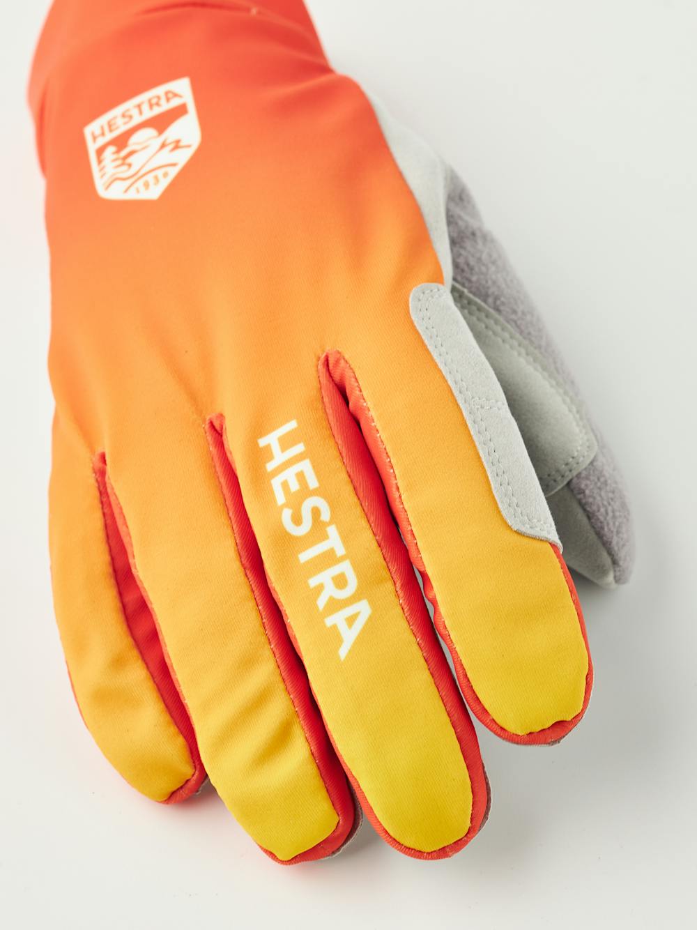 Orange and yellow fabric cross-country ski glove with gray synthetic suede palm (2 of 9)