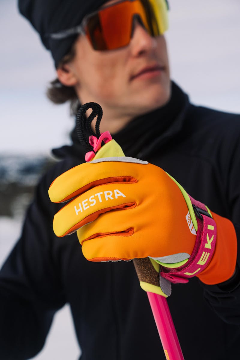 Orange and yellow fabric cross-country ski glove with gray synthetic suede palm (9 of 9)
