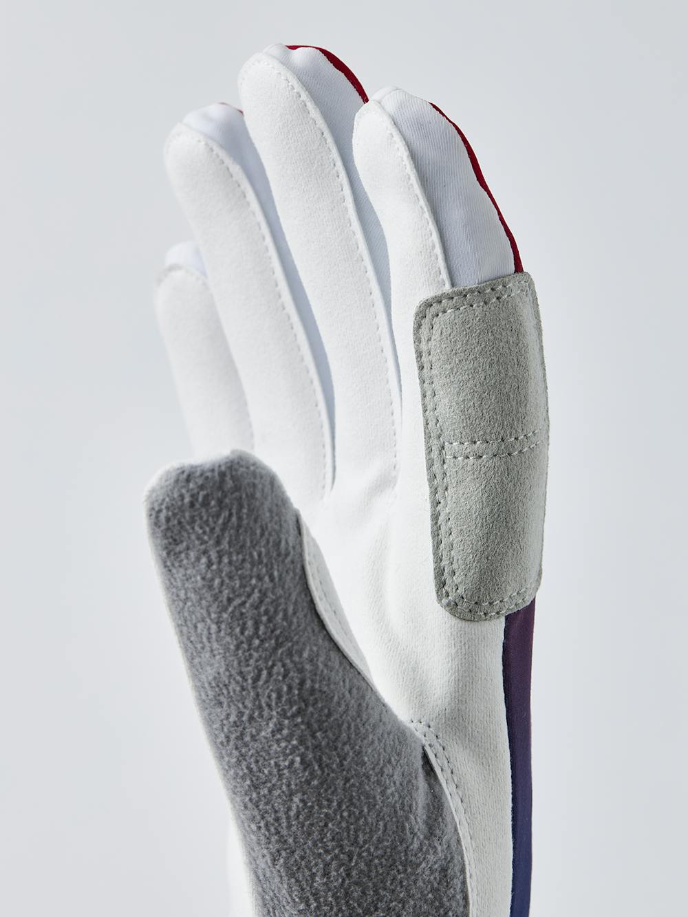 Blue and red fabric cross-country ski glove with white synthetic suede palm (5 of 7)