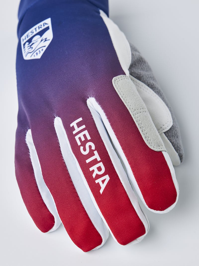 Blue and red fabric cross-country ski glove with white synthetic suede palm (2 of 7)