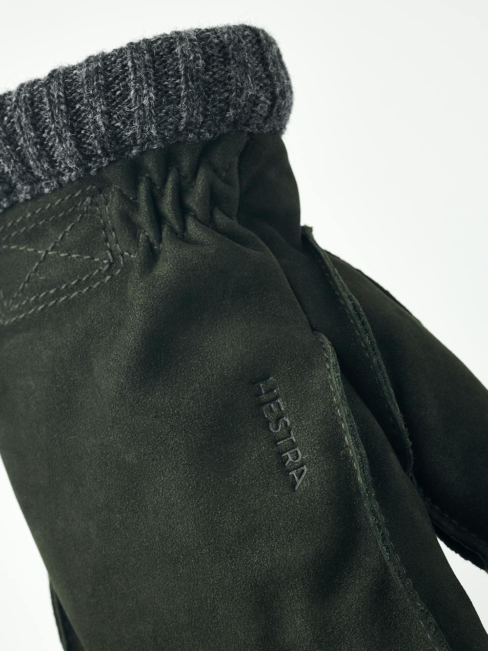 Dark green machine-sewn goat suede glove with gray knitted cuff
 (4 of 5)