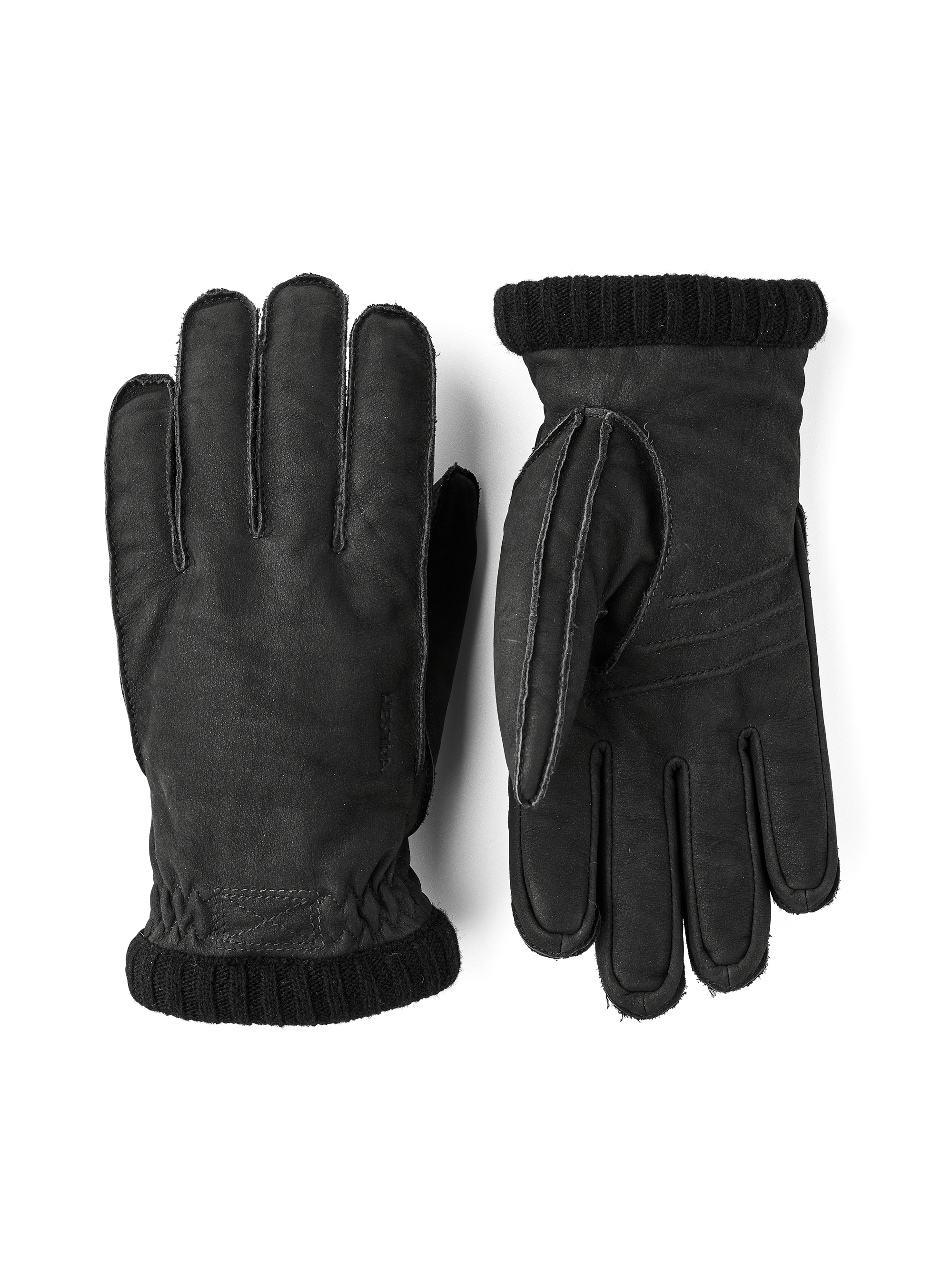 Svart maskinsydd handske i getmocka med stickad mudd
 (1 av 5)