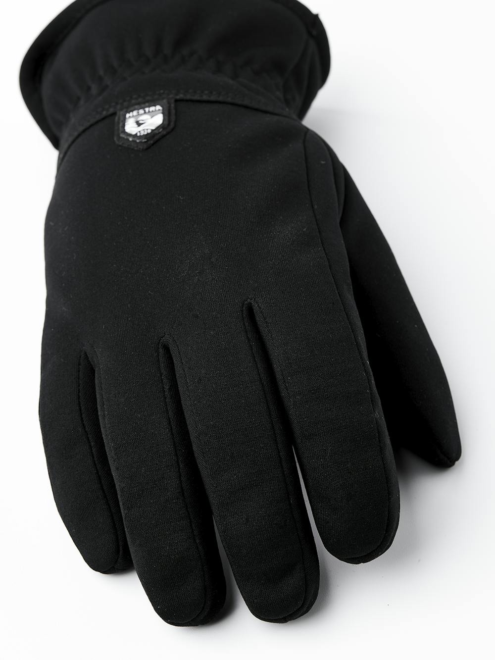 Black machine-sewn fabric glove with elasticated wrist
(5 of 5)