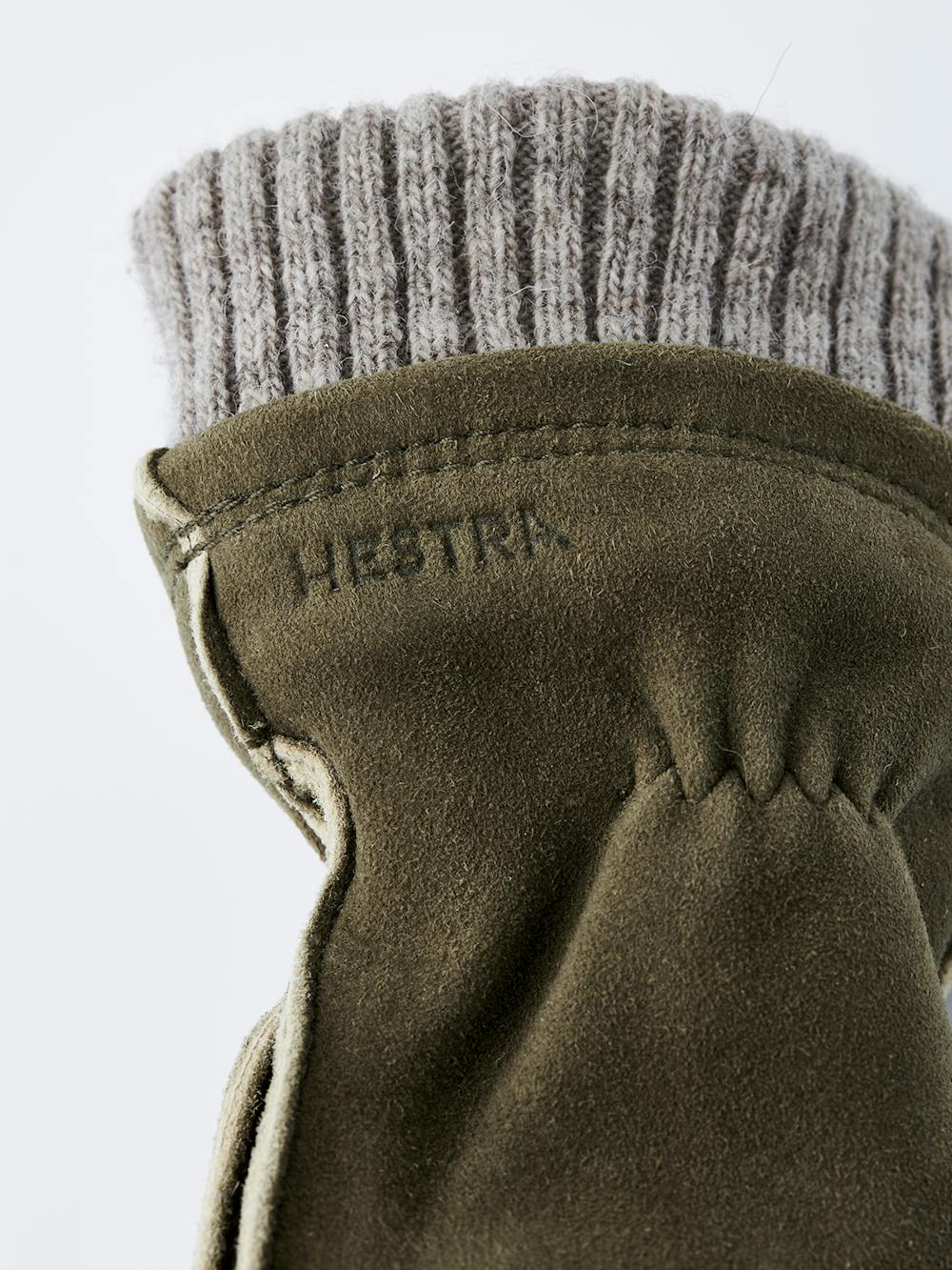 Moss green machine-sewn suede mitten with beige knitted cuff
(2 of 5)
