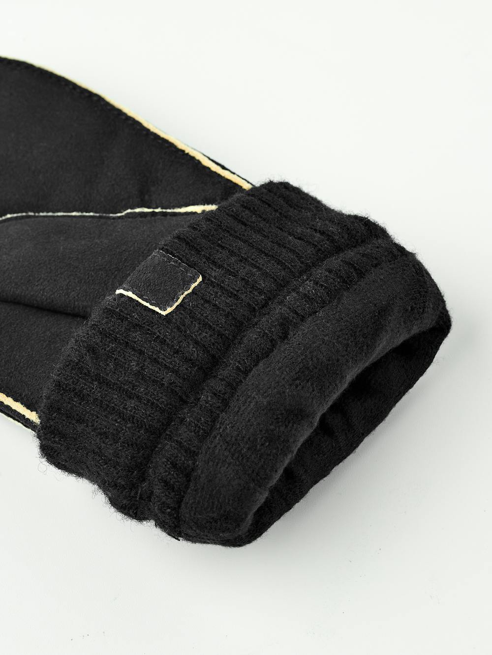 Black machine-sewn suede mitten with knitted cuff
(5 of 6)