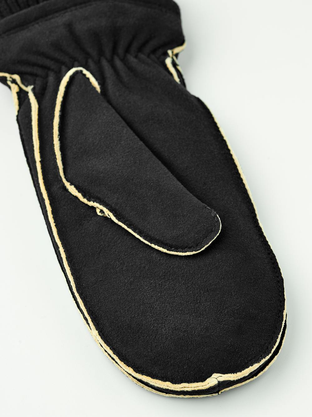 Black machine-sewn suede mitten with knitted cuff
(3 of 6)