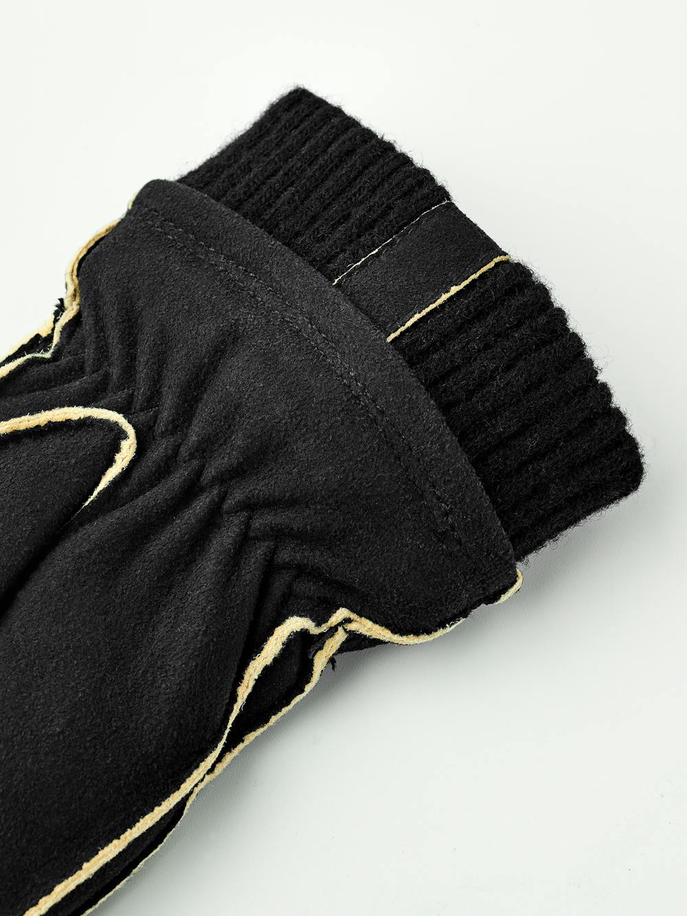 Black machine-sewn suede mitten with knitted cuff
 (4 of 6)