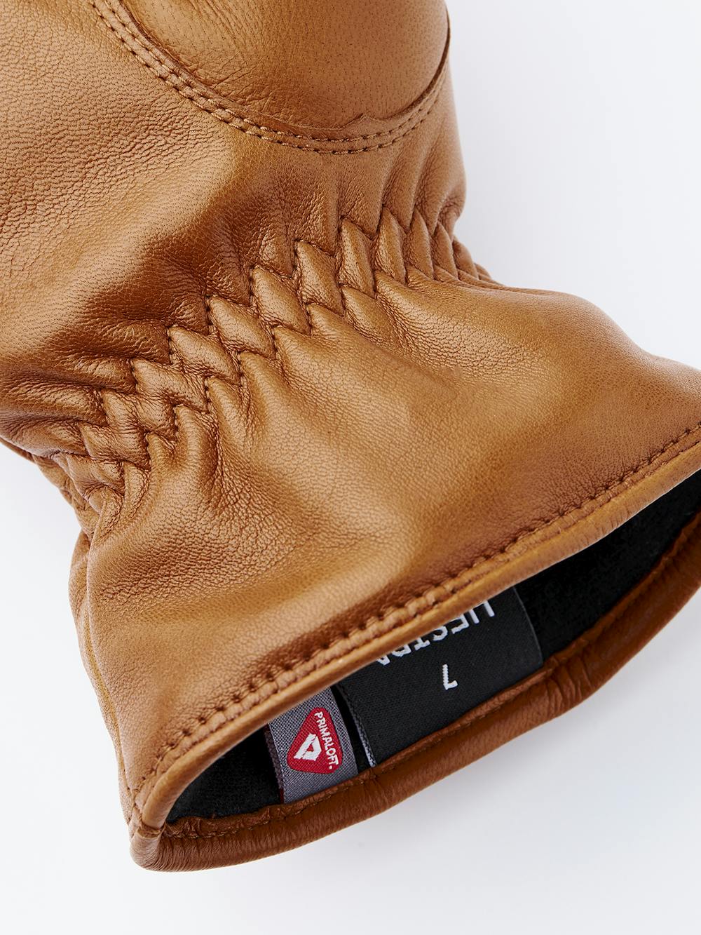 Light brownish-yellow machine-sewn hairsheep leather mitten with elasticated cuff
(5 of 5)