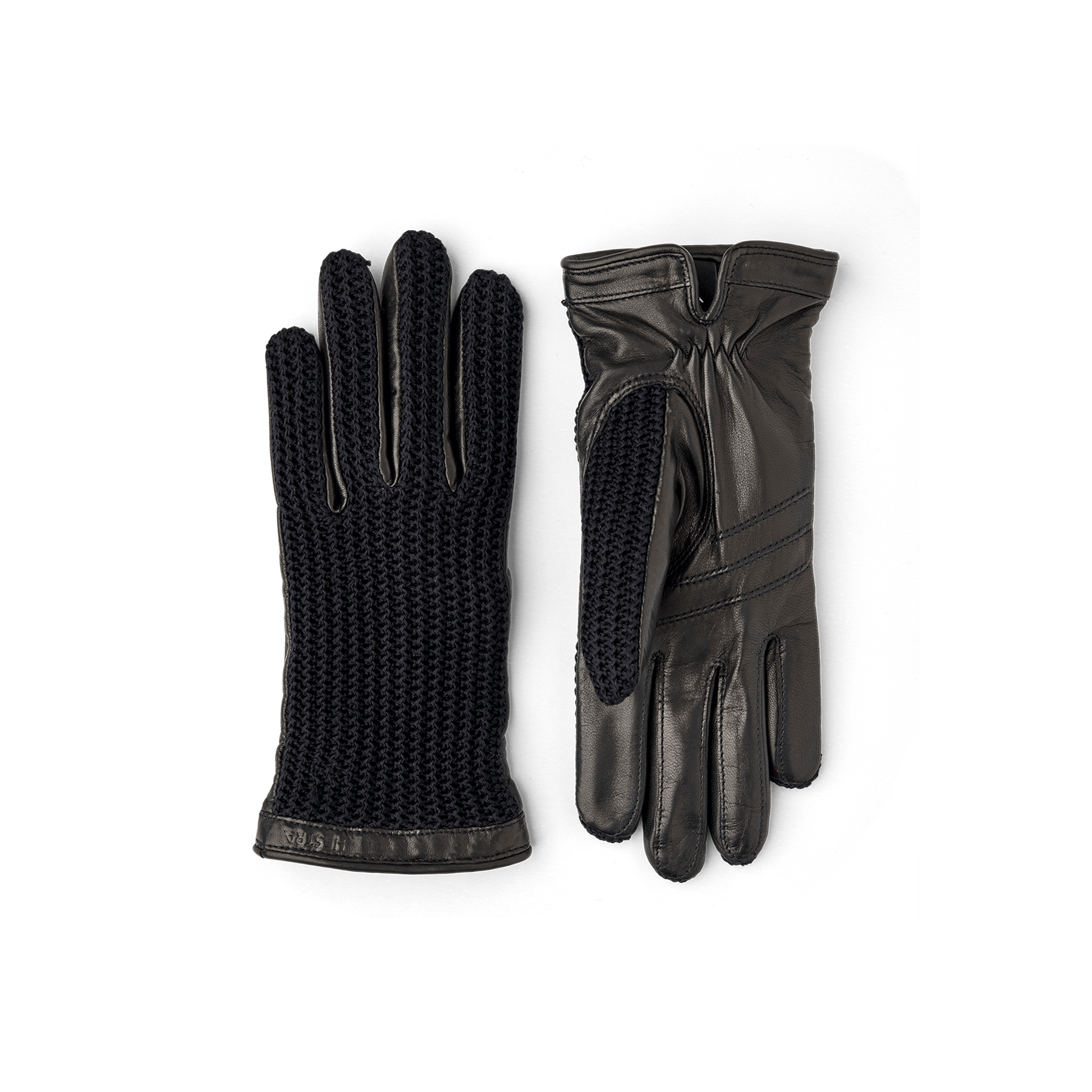 Svarta maskinsydd skinnhandske med virkad bakhand i bomull
 (1 av 3)