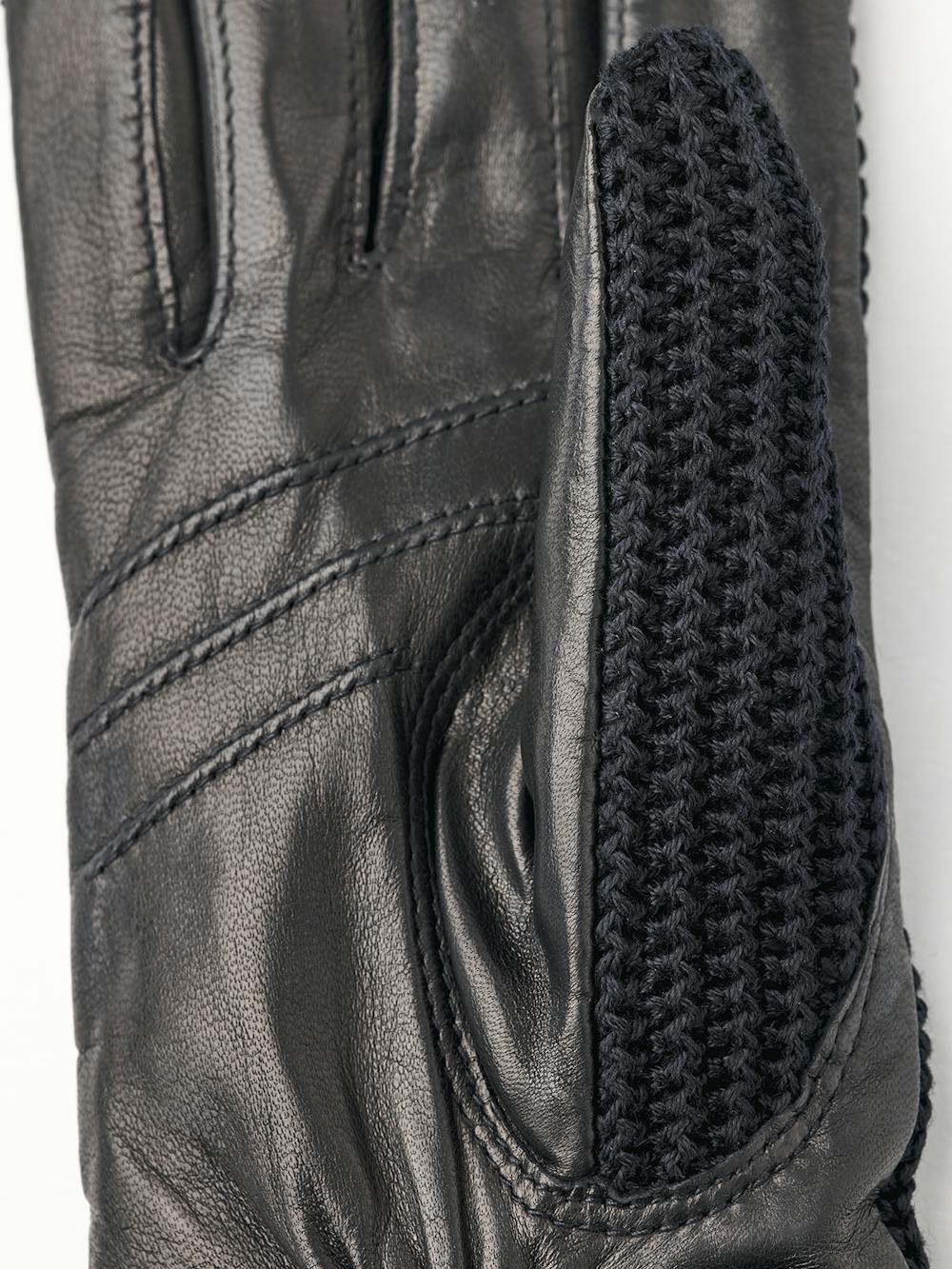 Svarta maskinsydd skinnhandske med virkad bakhand i bomull
 (3 av 3)