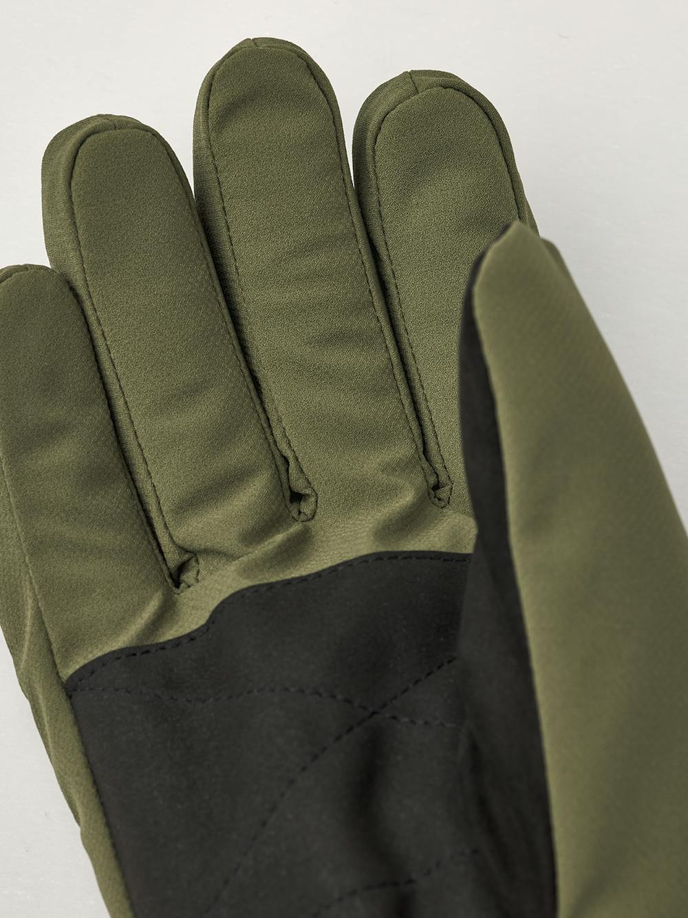 Green fabric glove with elasticated fabric cuff and black palm
 (3 of 4)