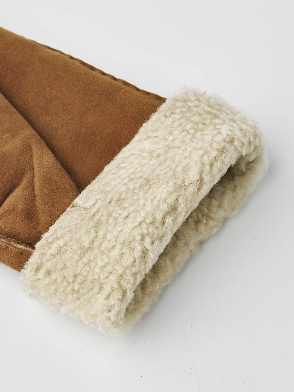 Light brownish-yellow hand-sewn fur suede glove
 (5 of 5)