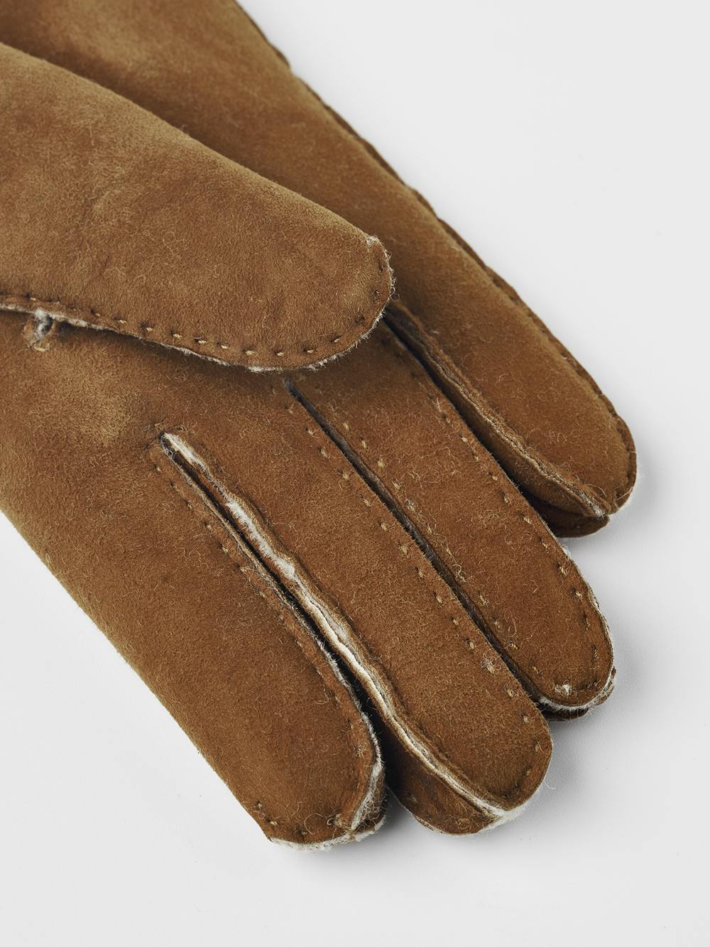 Brown hand-sewn fur suede glove
(5 of 5)