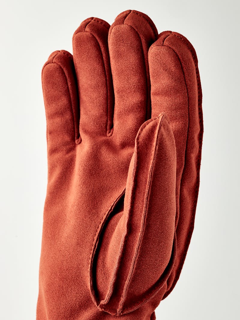 Orange machine-sewn synthetic suede glove
 (3 of 5)