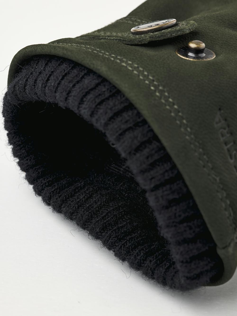 Dark green machine-sewn goat nubuck glove with leather strap and button
(3 of 4)