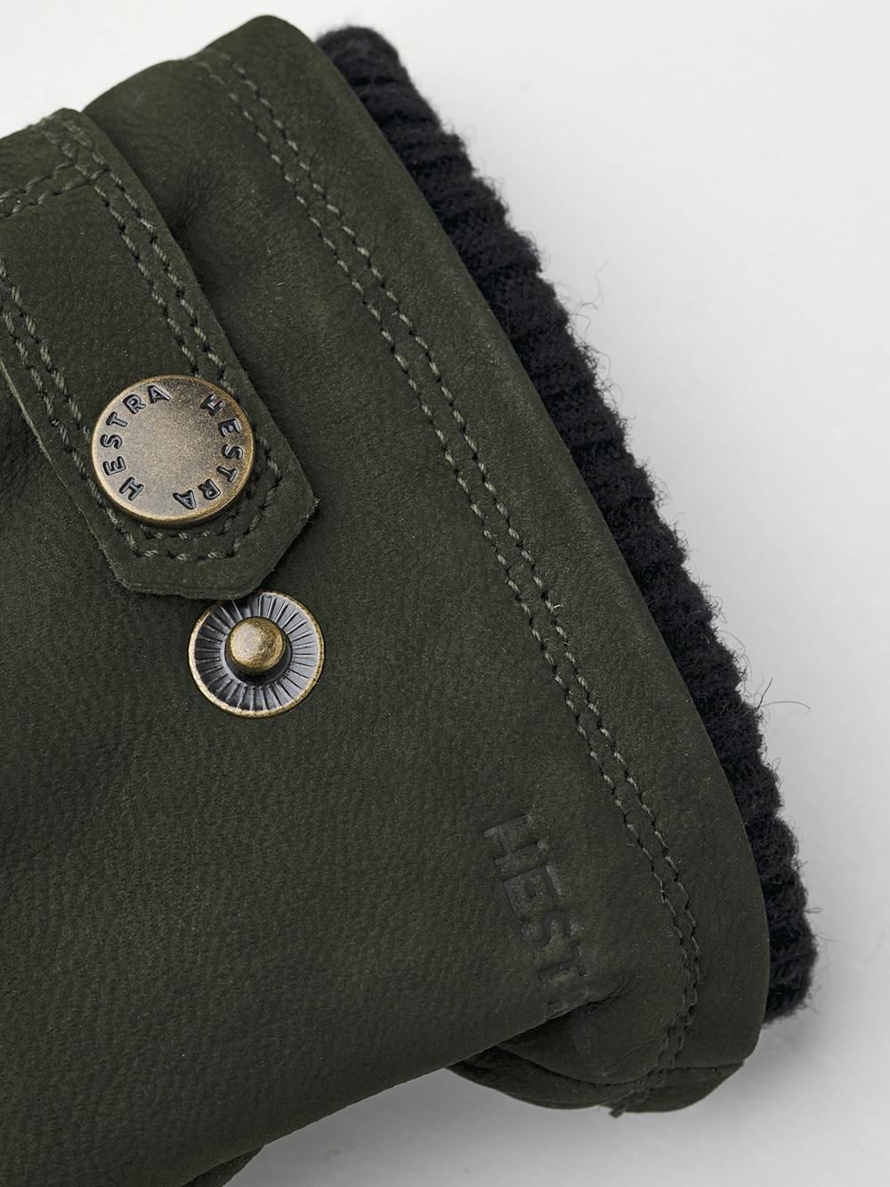 Dark green machine-sewn goat nubuck glove with leather strap and button
 (4 of 4)