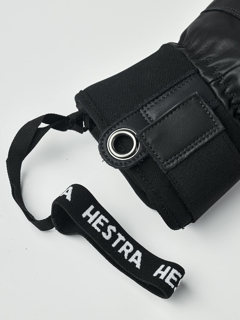 Mörkblå och mörkbrun skidhandske i nötnappa
 (8 av 10)