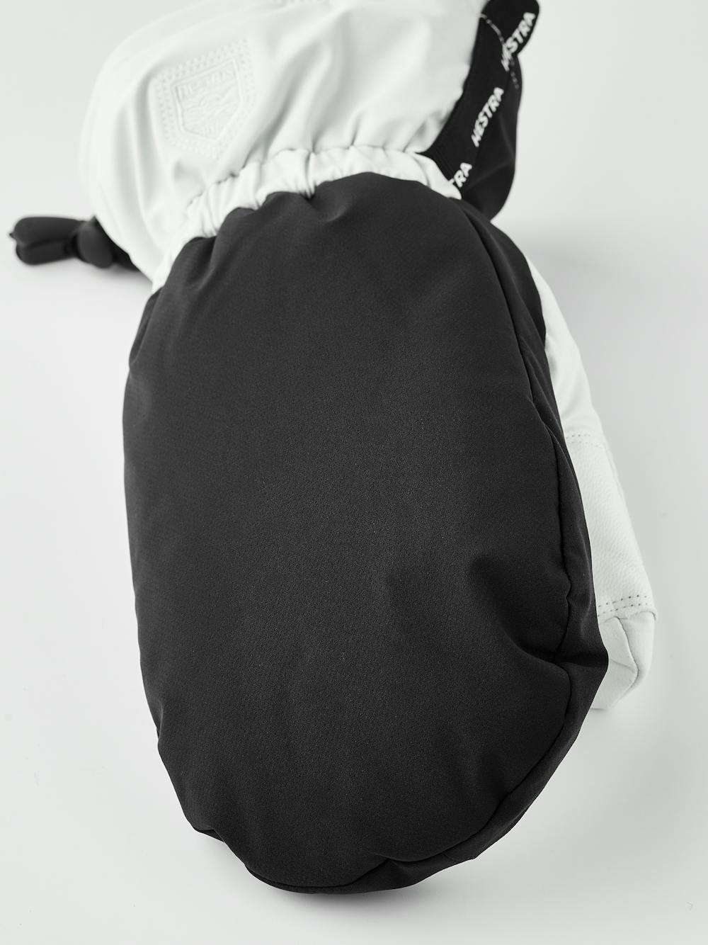 Schwarz-weißer Skihandschuh aus Stoff mit weißem Ziegenleder an der Innenhand (3 oder 7)