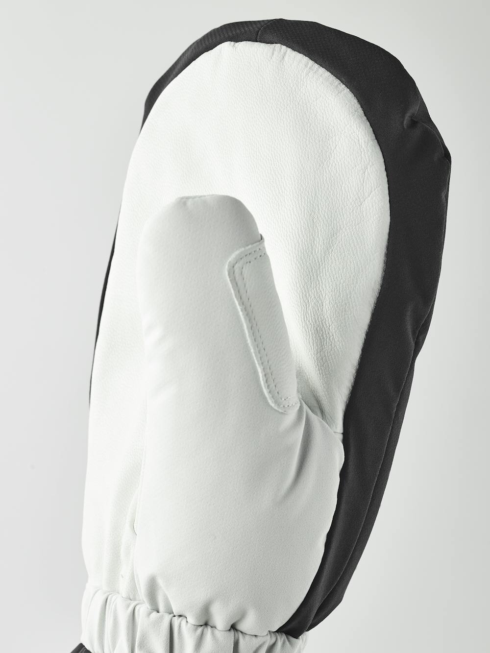 Schwarz-weißer Skihandschuh aus Stoff mit weißem Ziegenleder an der Innenhand (2 oder 7)