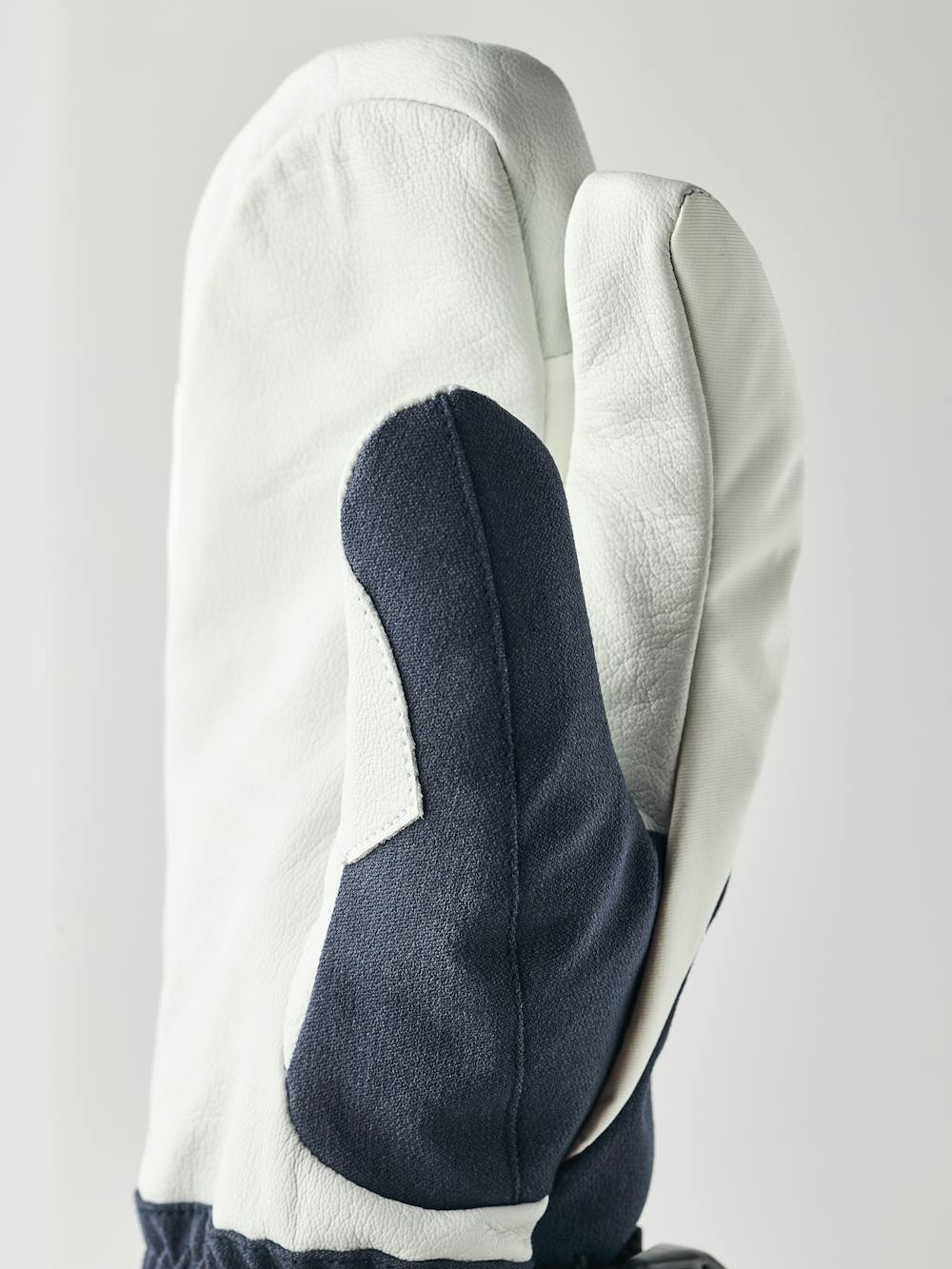 Dark blue three finger glove with white goat leather palm and wrist adjustment (2 of 6)