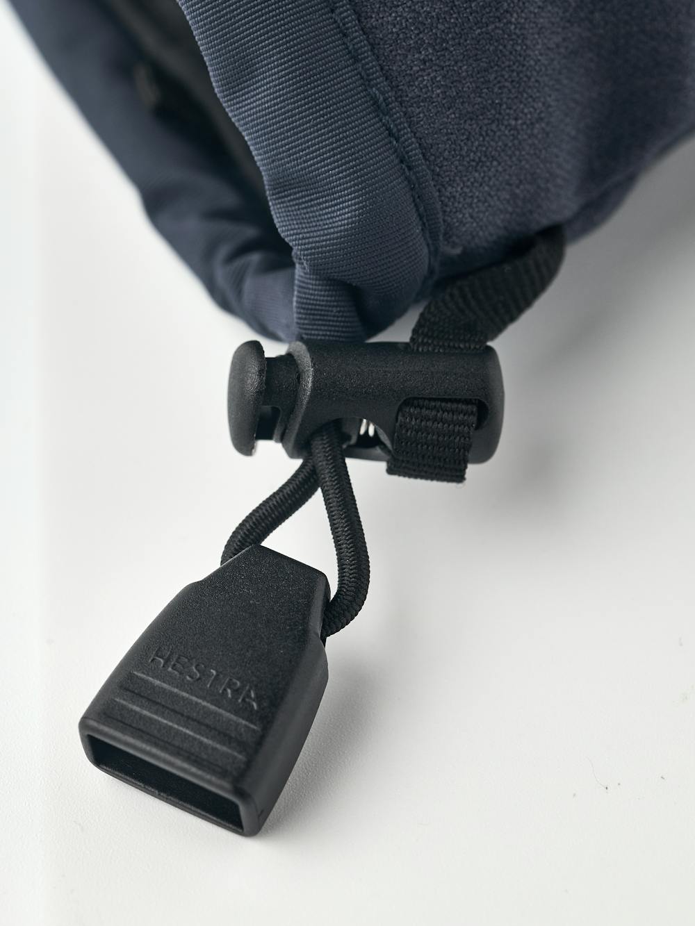 Dark blue three finger glove with white goat leather palm and wrist adjustment (4 of 6)