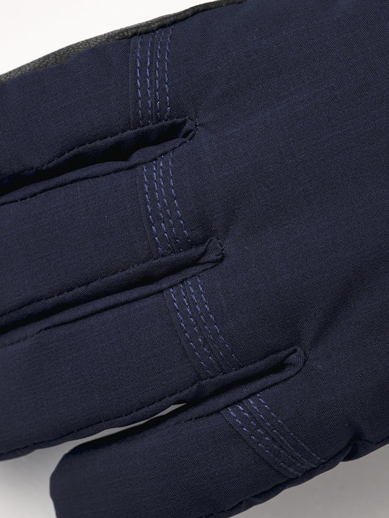 Dark blue fabric ski glove with black hairsheep palm and wrist adjustment (2 of 4)